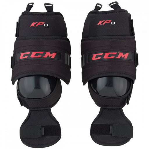 Black Goalie knee protectors with red writing