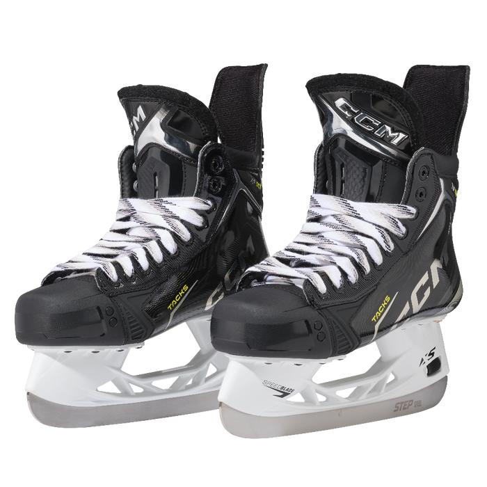 black ccm skates with silver accents 